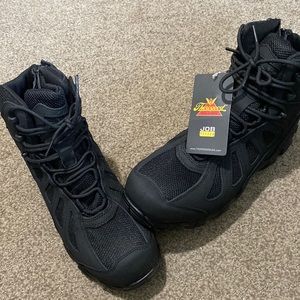 Work boots with protective metal toe covering (safety shoes). Never used.